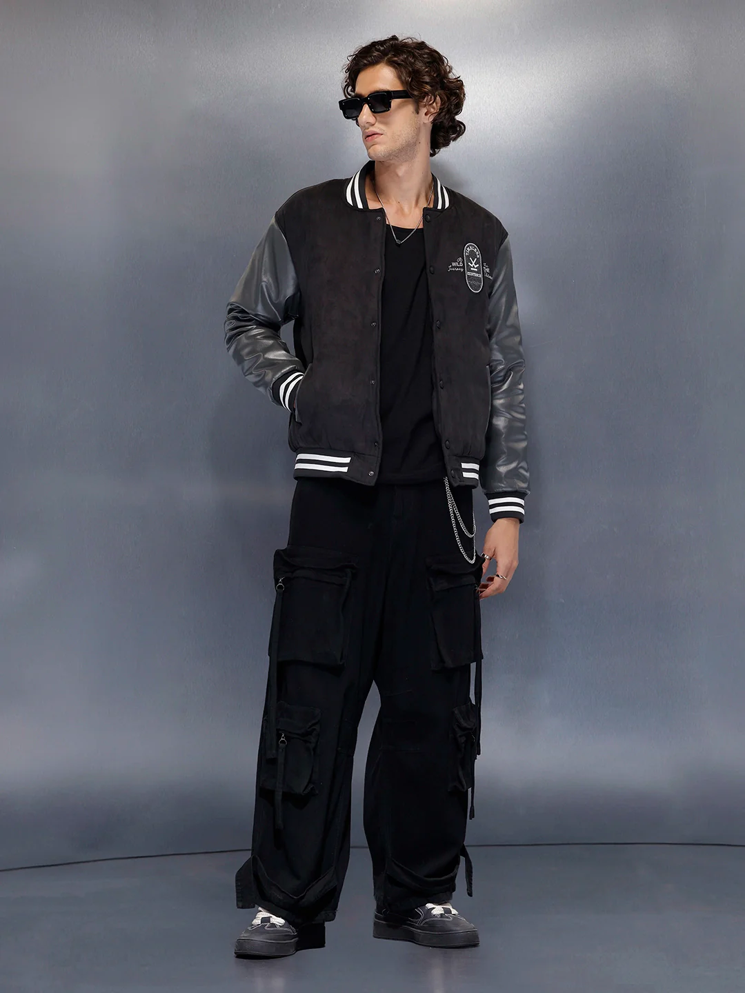 Men’s black varsity jacket with leather sleeves | Black