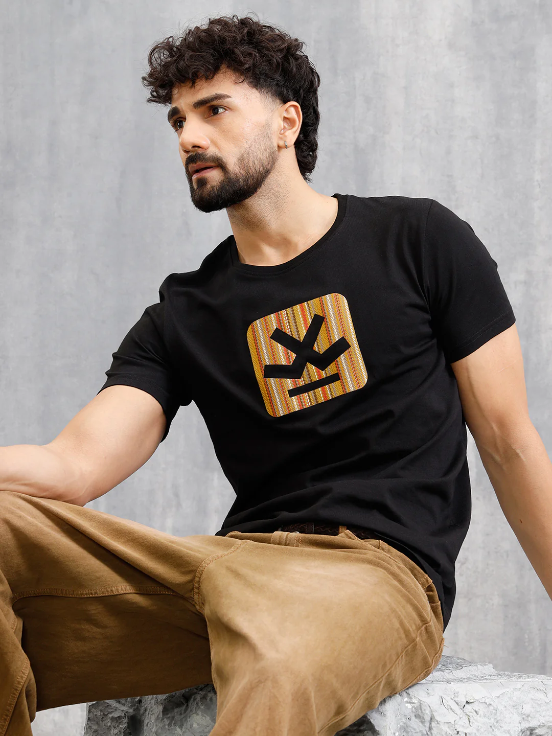 Textured Laser Cut Transfer Print Brand Carrier Crew Neck T-Shirt | Black